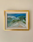 Framed vintage oil painting of a landscape with a gold frame. Available at Hue. 