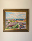 Framed vintage oil painting of a coastal village scene. Available at Hue. 