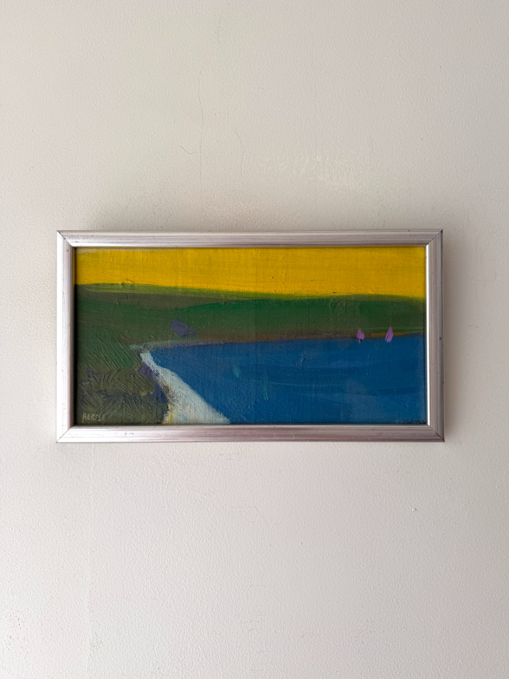 Framed vinatge abstract painting with a yellow background and blue water. Available at Hue.