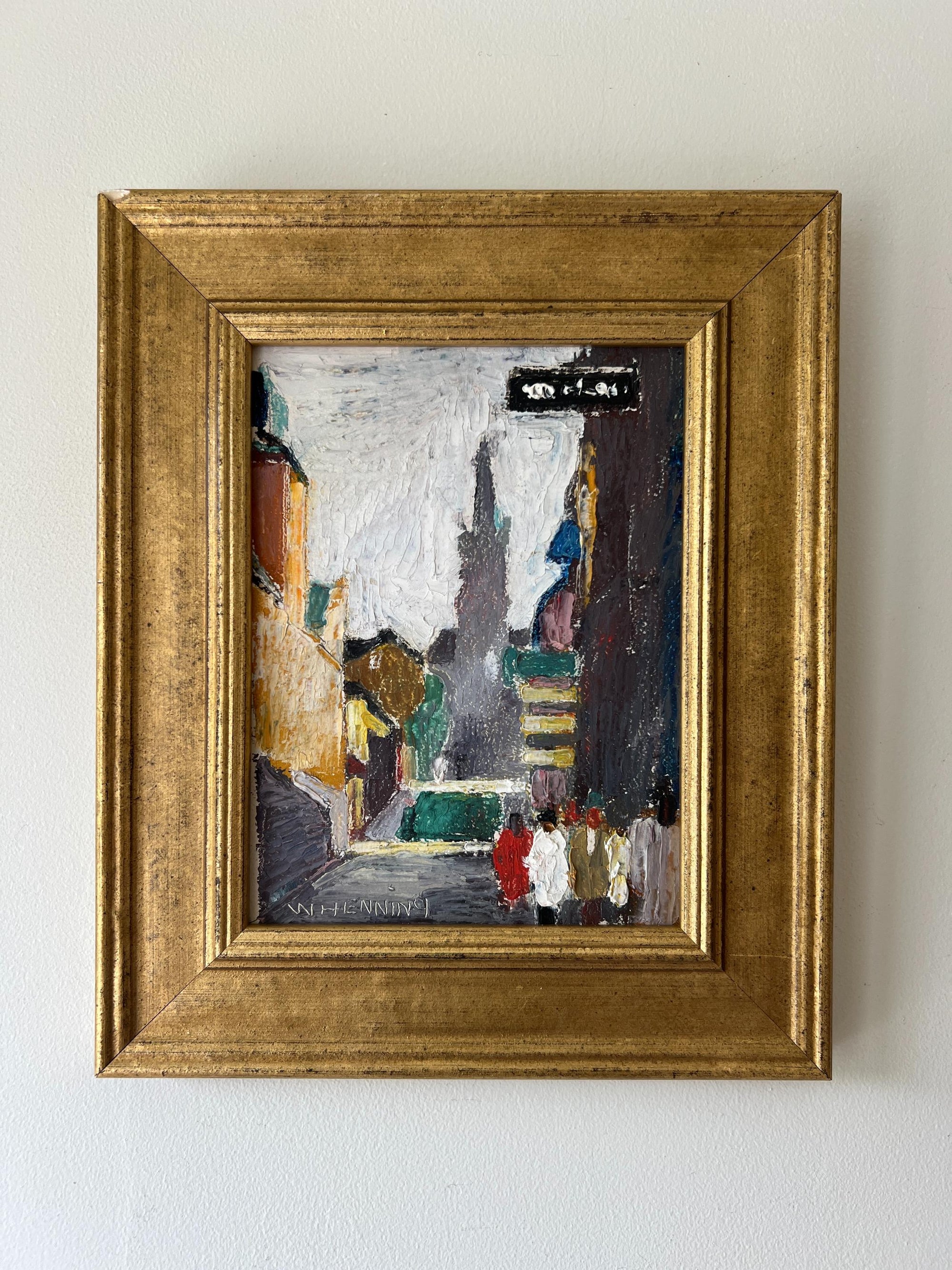Framed vintage oil painting of a cityscape with a gilt frame, available at Hue 
