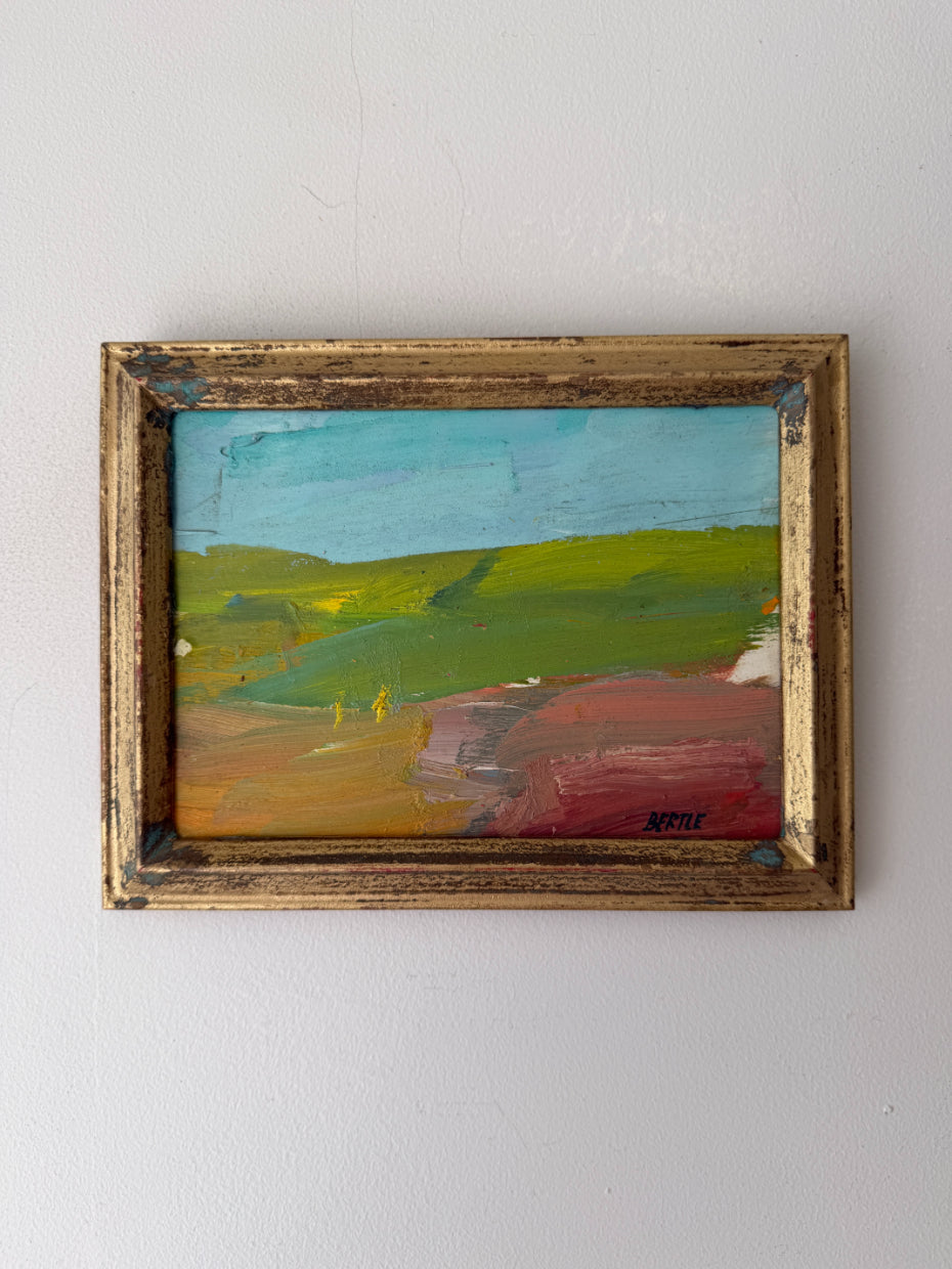 Small vintage oil landscape painting in a rustic gold frame. Available at Hue.