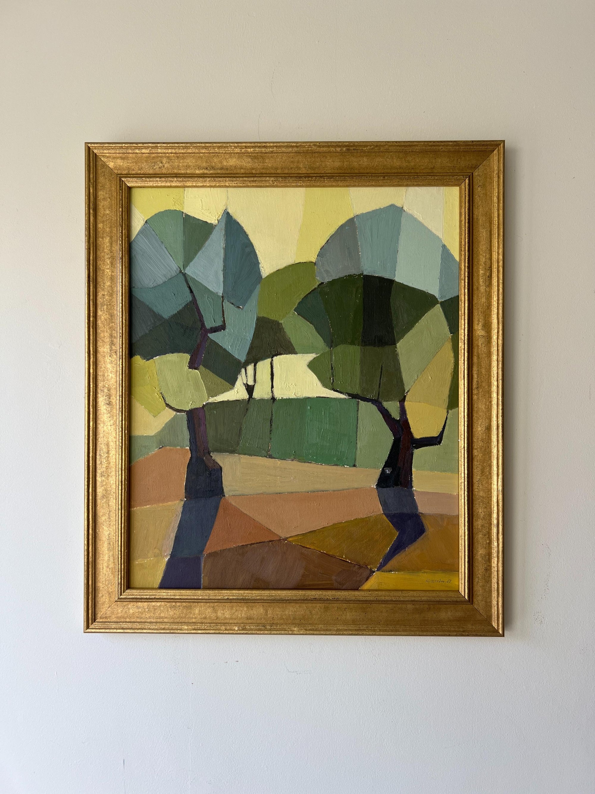 Framed vintage oil painting of a cubist landscape with geometric trees. Available at Hue. 