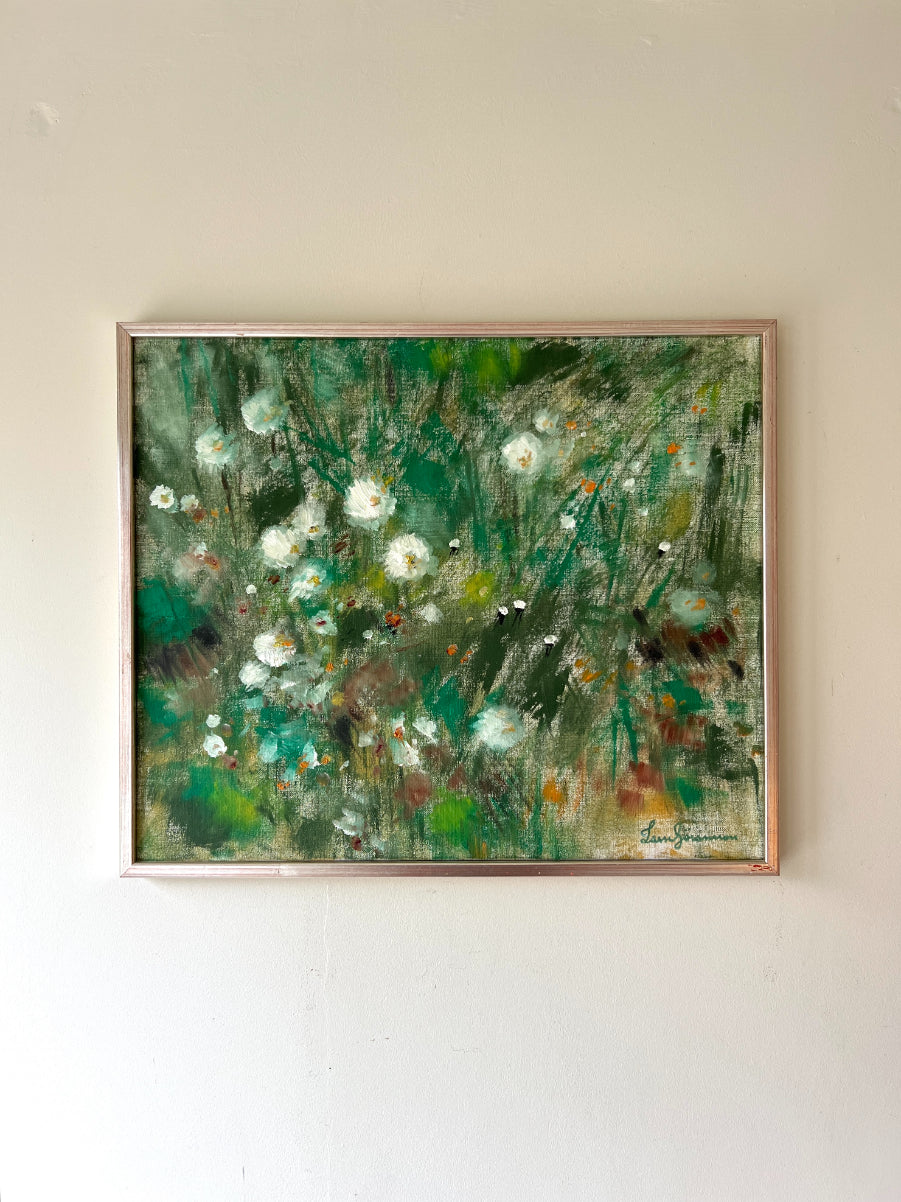 Framed vintage oil painting of a floral meadow. Available at Hue. 