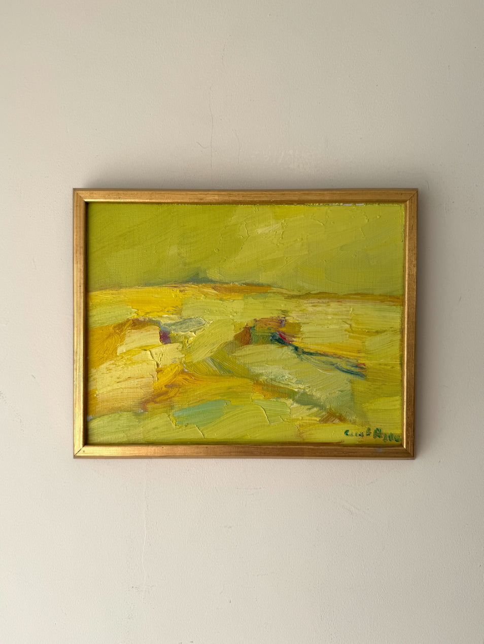 Framed vintage oil  painting with a yellow &amp; ochre landscape. Available at Hue.