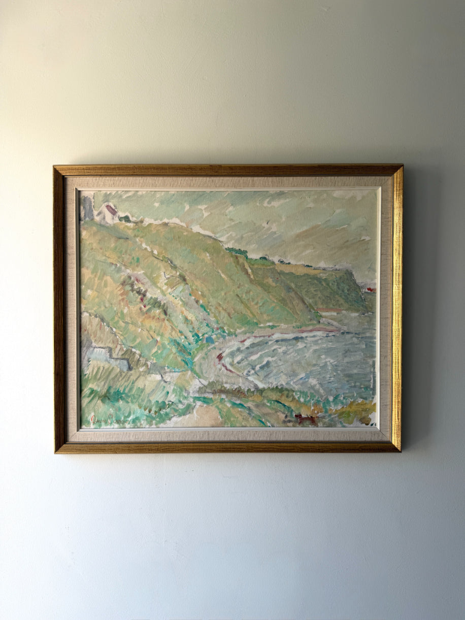 Framed vintage oil painting of a coastal landscape. Available at Hue. 