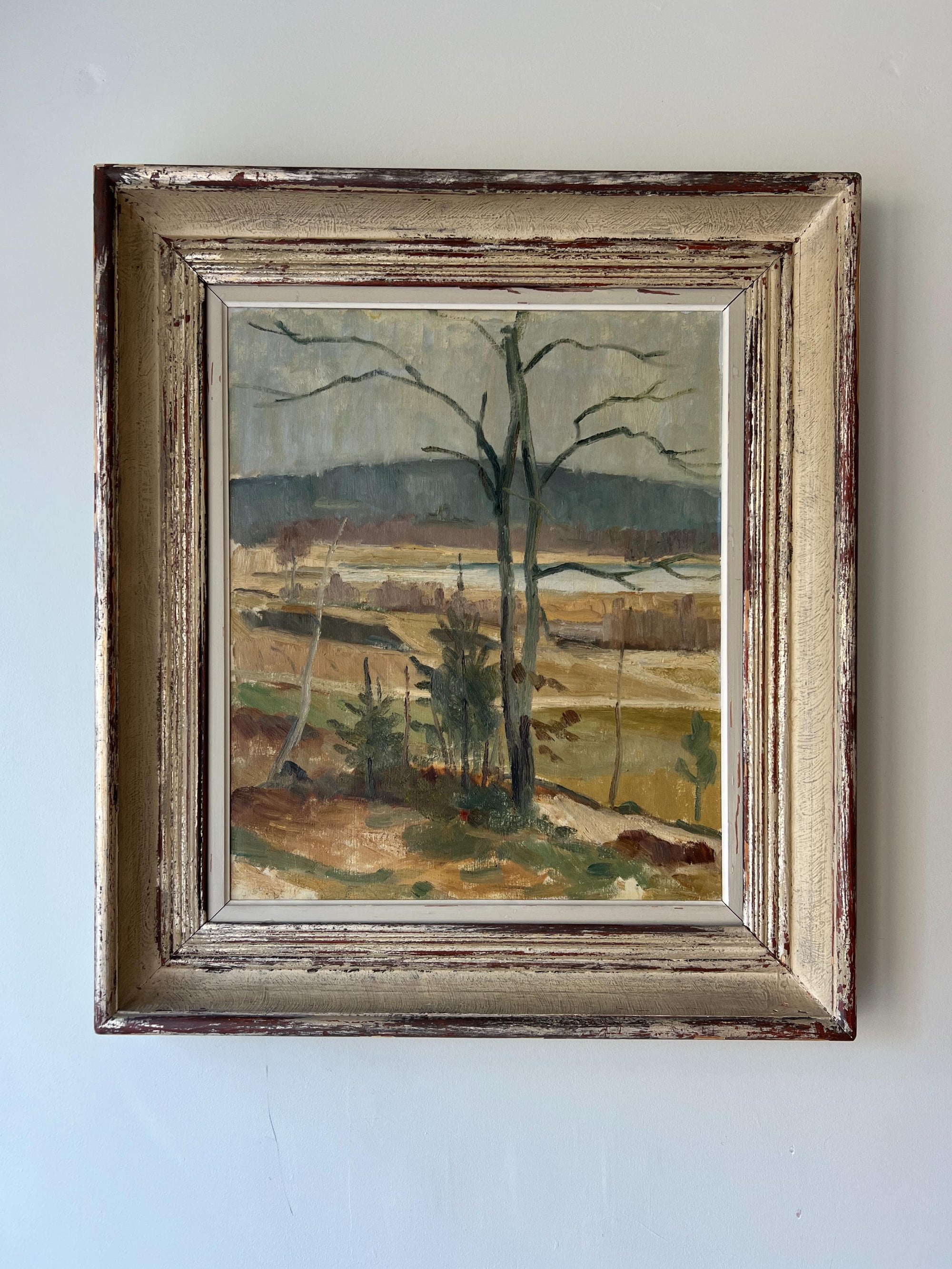Framed vintage oil painting of a landscape with trees and fields. Available at Hue.