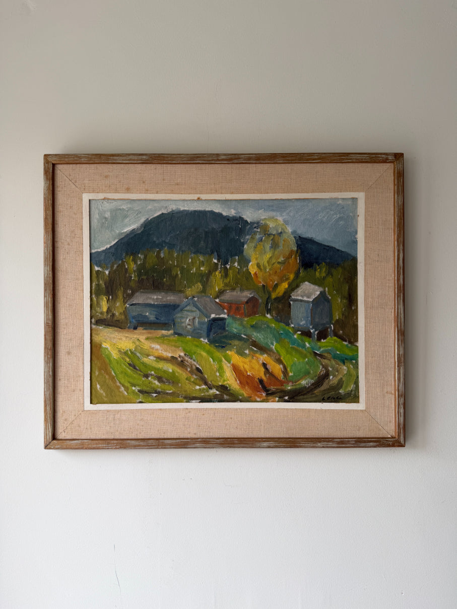 Framed vintage oil  painting of a landscape with farm huts. Available at Hue. 