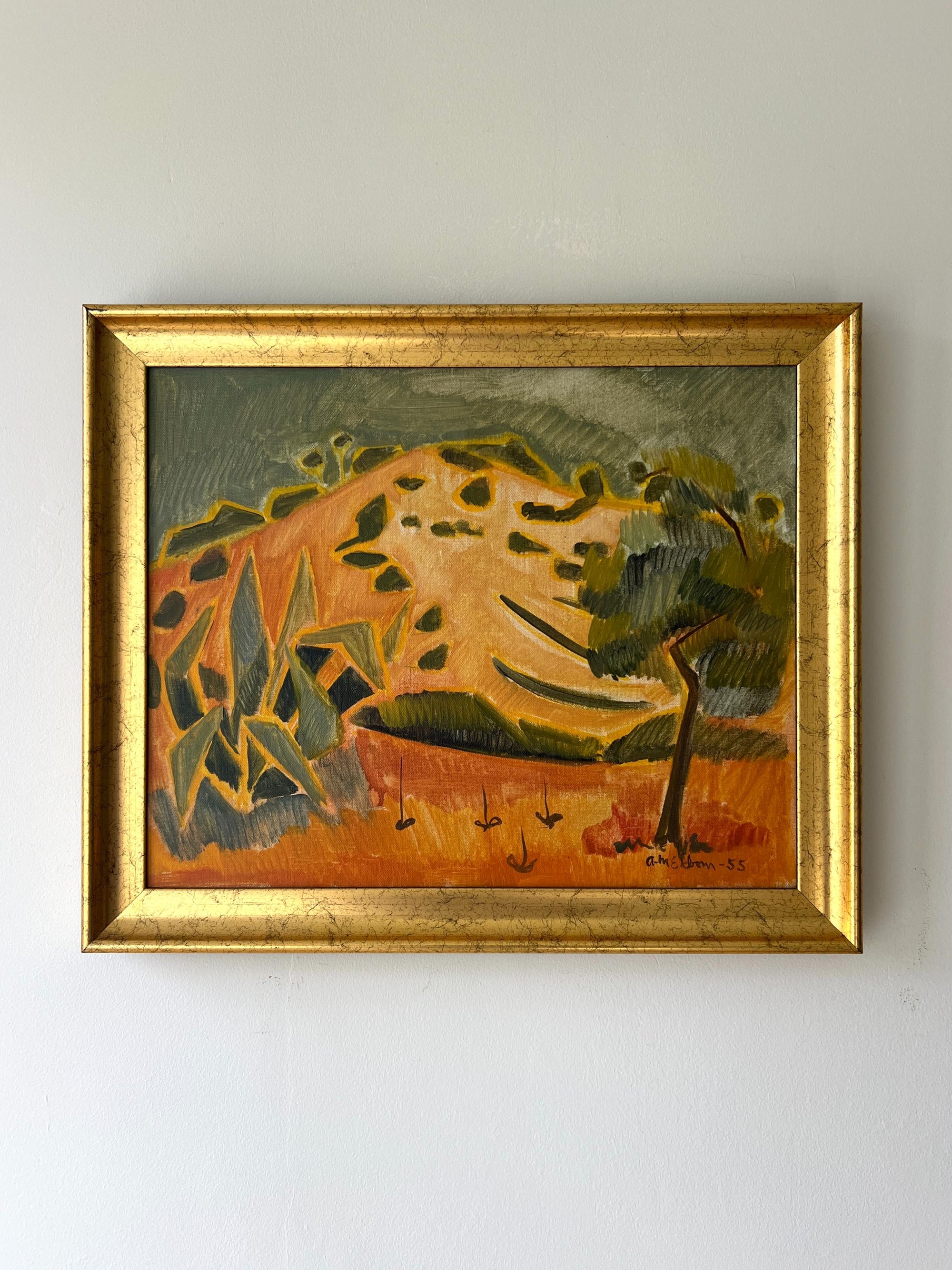 Framed vintage oil painting of an arid landscape with trees and cacti in a gilt frame, available at Hue.