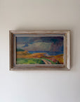 Framed vintage oil painting of a seascape with winding coastal track. Available at Hue.