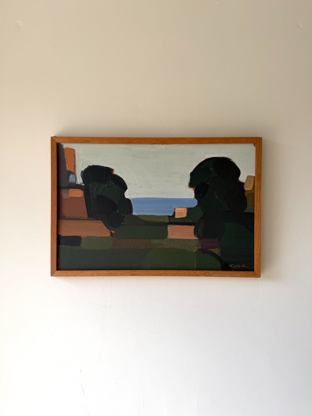 Framed vintage oil painting of silhouetted blocked shapes infront of a coastal sea view. Available at Hue.