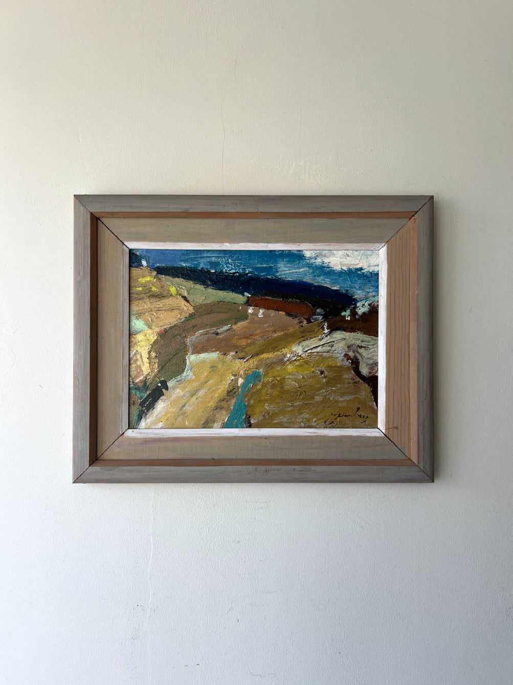 Framed vintage abstract oil painting of a landscape in ochre tones. Available at Hue. 