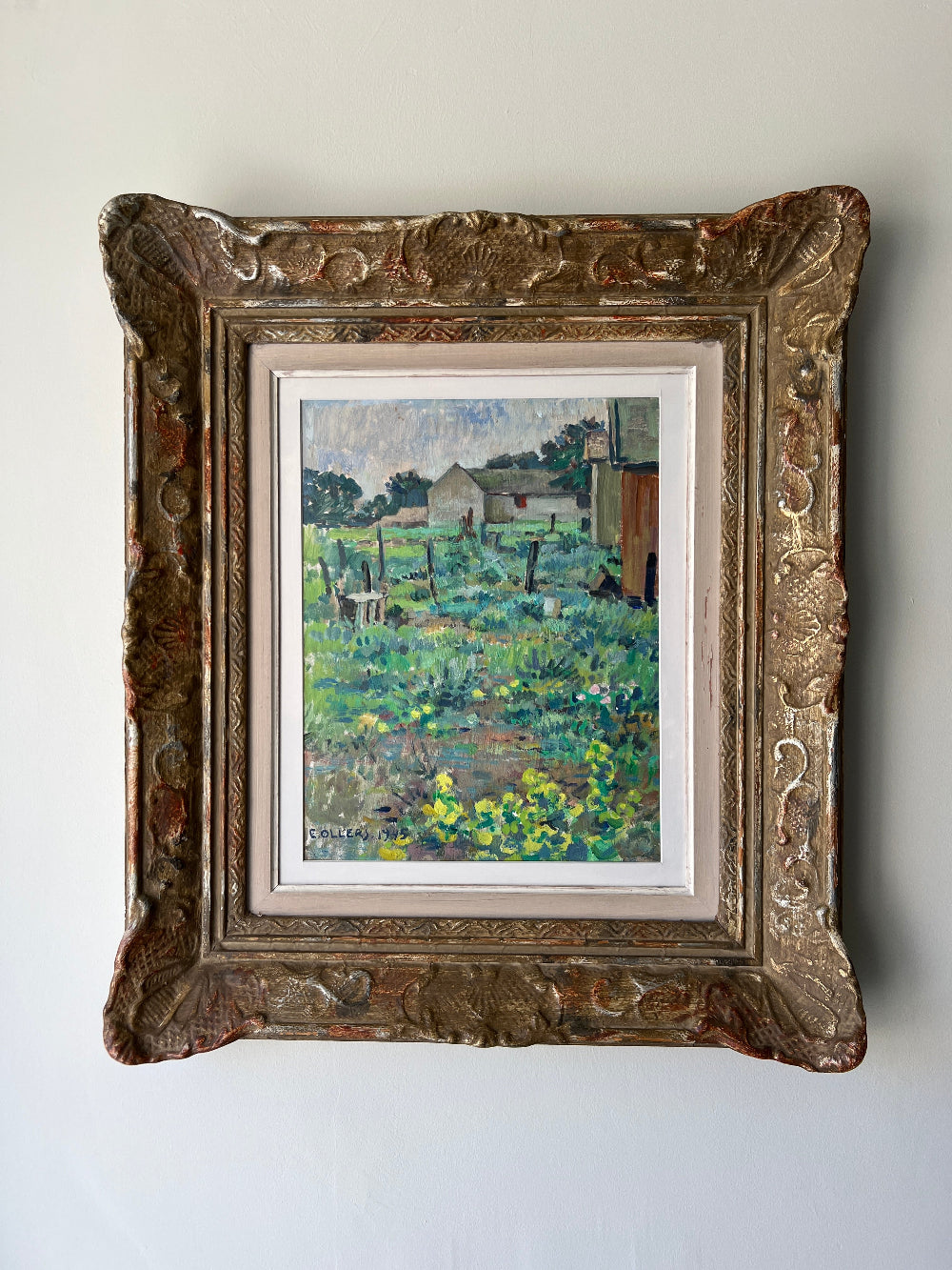 Framed vintage oil painting of a farm garden full of flowers in an ornate vintage frame, available at Hue