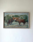 Framed vintage oil painting of cows in a field. Available at Hue.