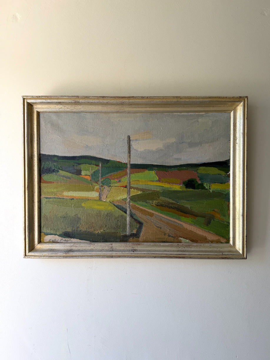 Framed vinatge oil painting of a landscape and farmland. Available at Hue. 