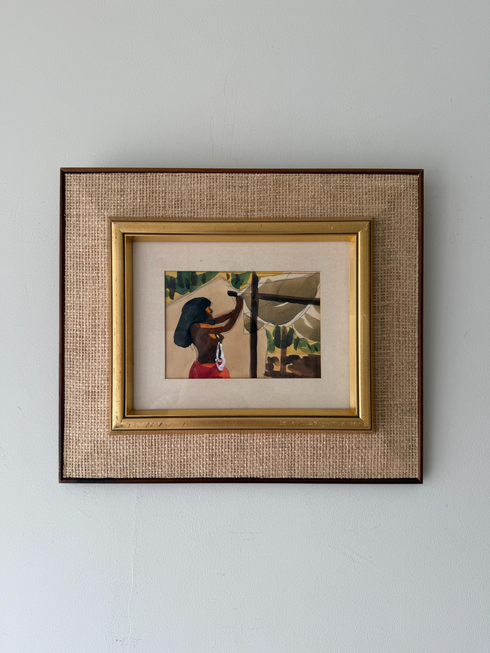 Framed vintage mixed-media artwork of an indigenous woman. 