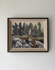 Framed vintage oil artwork of a landscape with forest trees and rocks. Available at Hue.