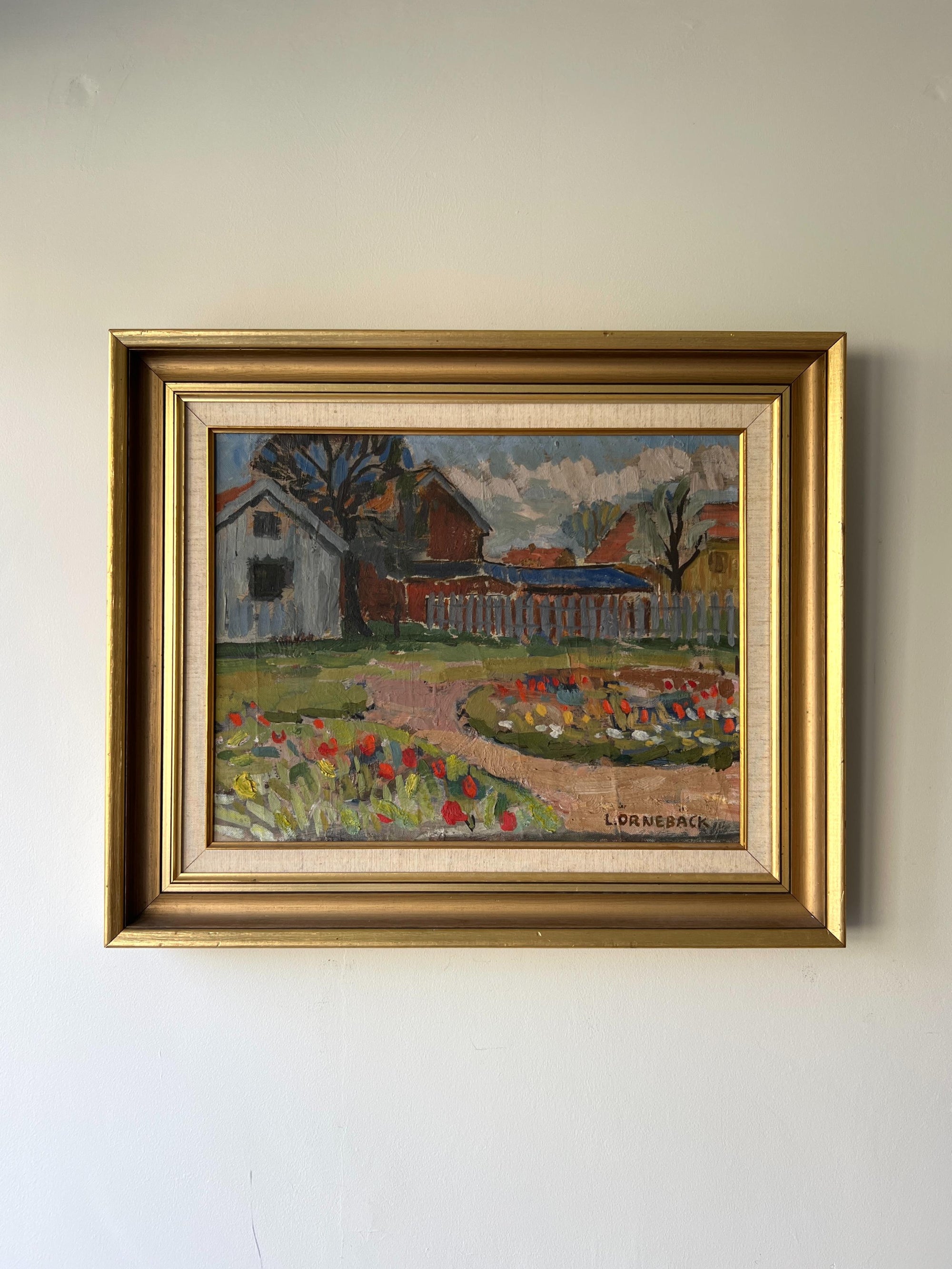Framed vintage oil painting of a rural landscape with houses and flowers, available at Hue.
