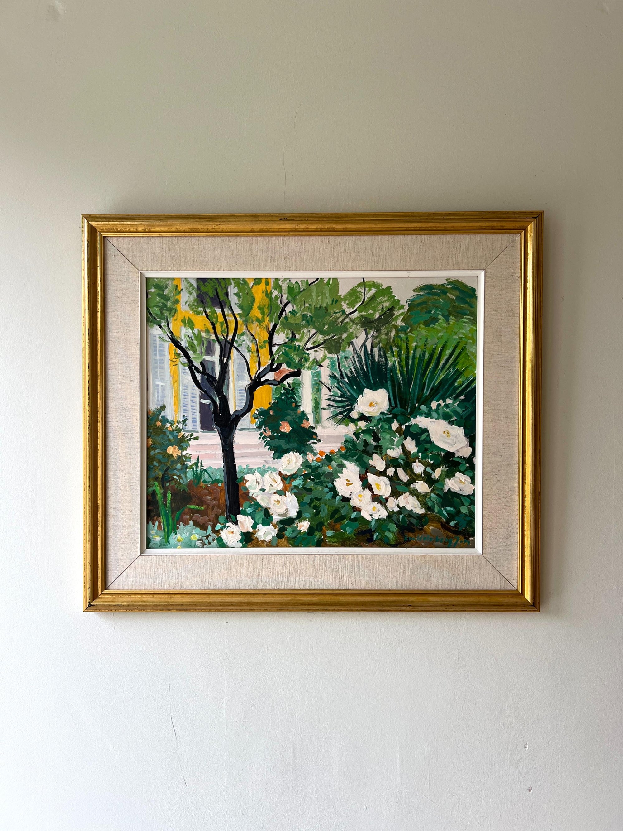 Framed vintage oil painting of a garden scene with flowers and trees in a gilt frame, available at Hue.