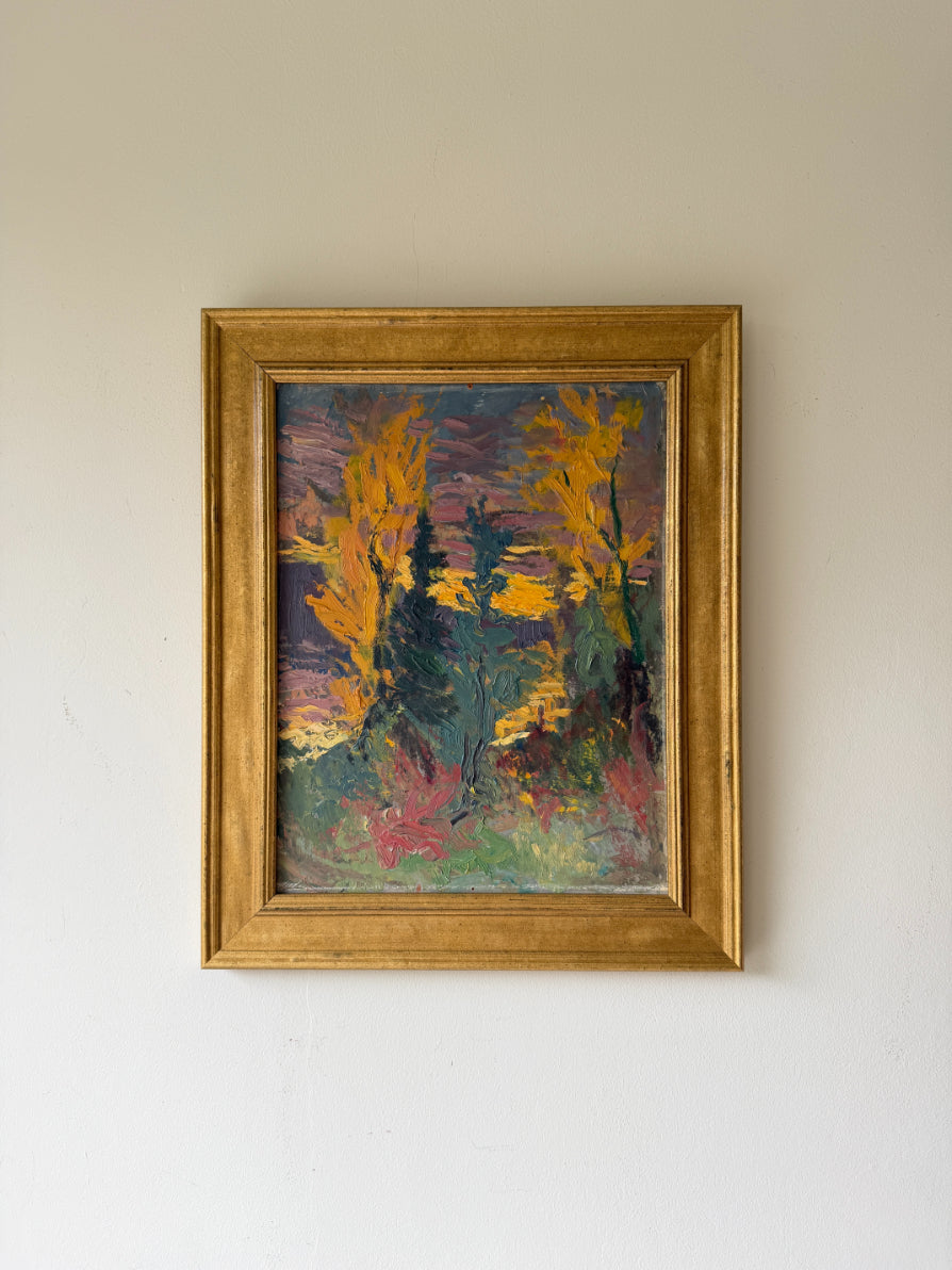 Framed vintage landscape oil painting of a forest with autumnal colours. Available at Hue. 