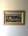 Framed vintage oil painting of a coastal village scene with blossom trees. Available at Hue. 