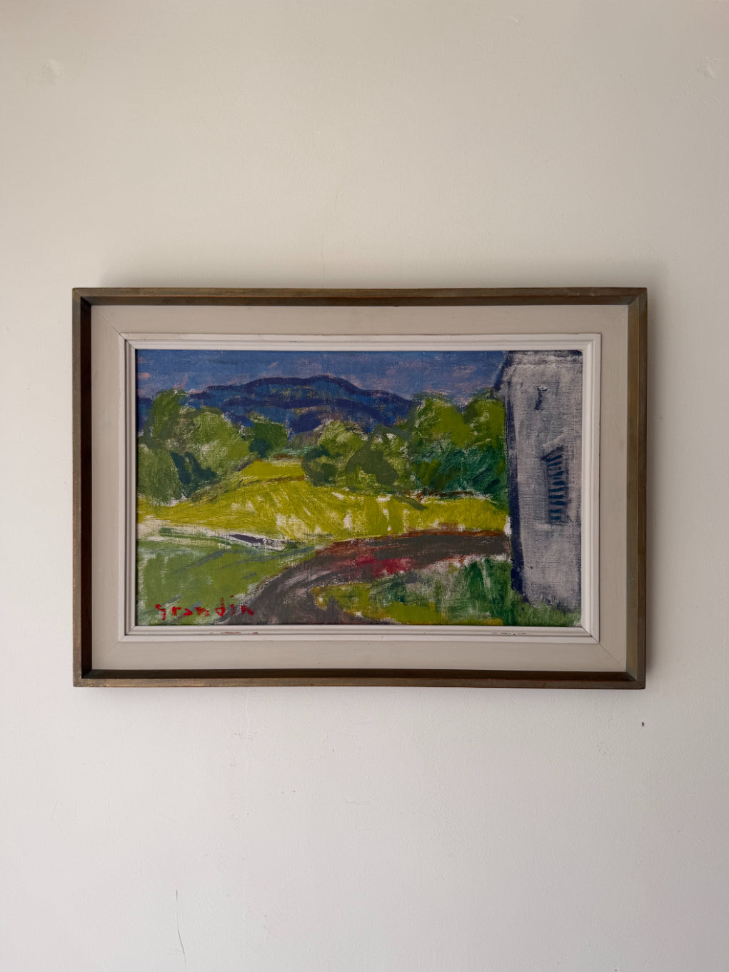Framed vintage oil painting of a landscape with mountains, meadows and trees. Available at Hue. 