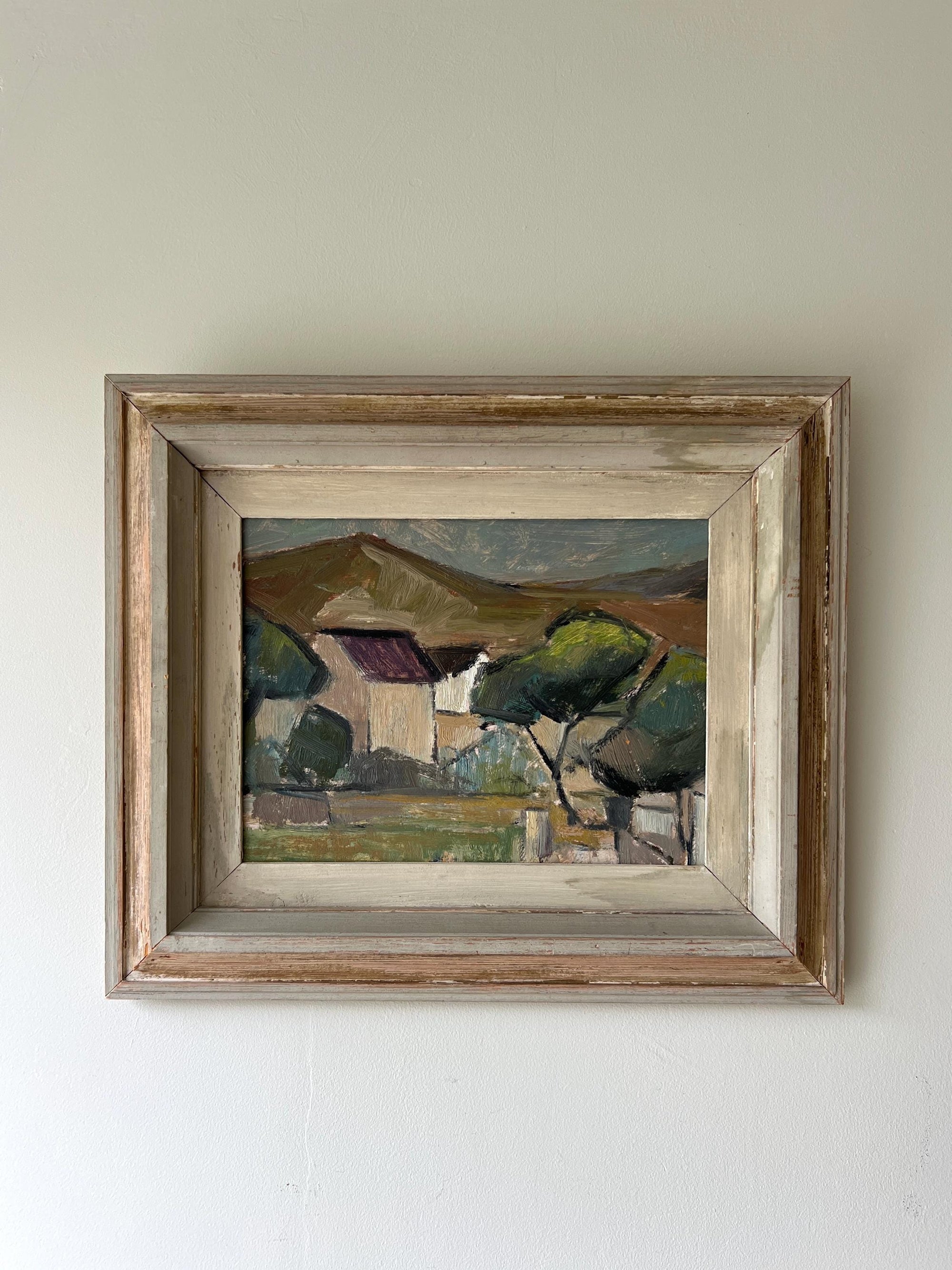Framed vintage oil painting of a landscape with trees and houses in a  vintage frame, available at Hue.