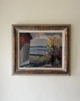 Framed vintage oil painting of a red house on the shores of a lake. Available at Hue.