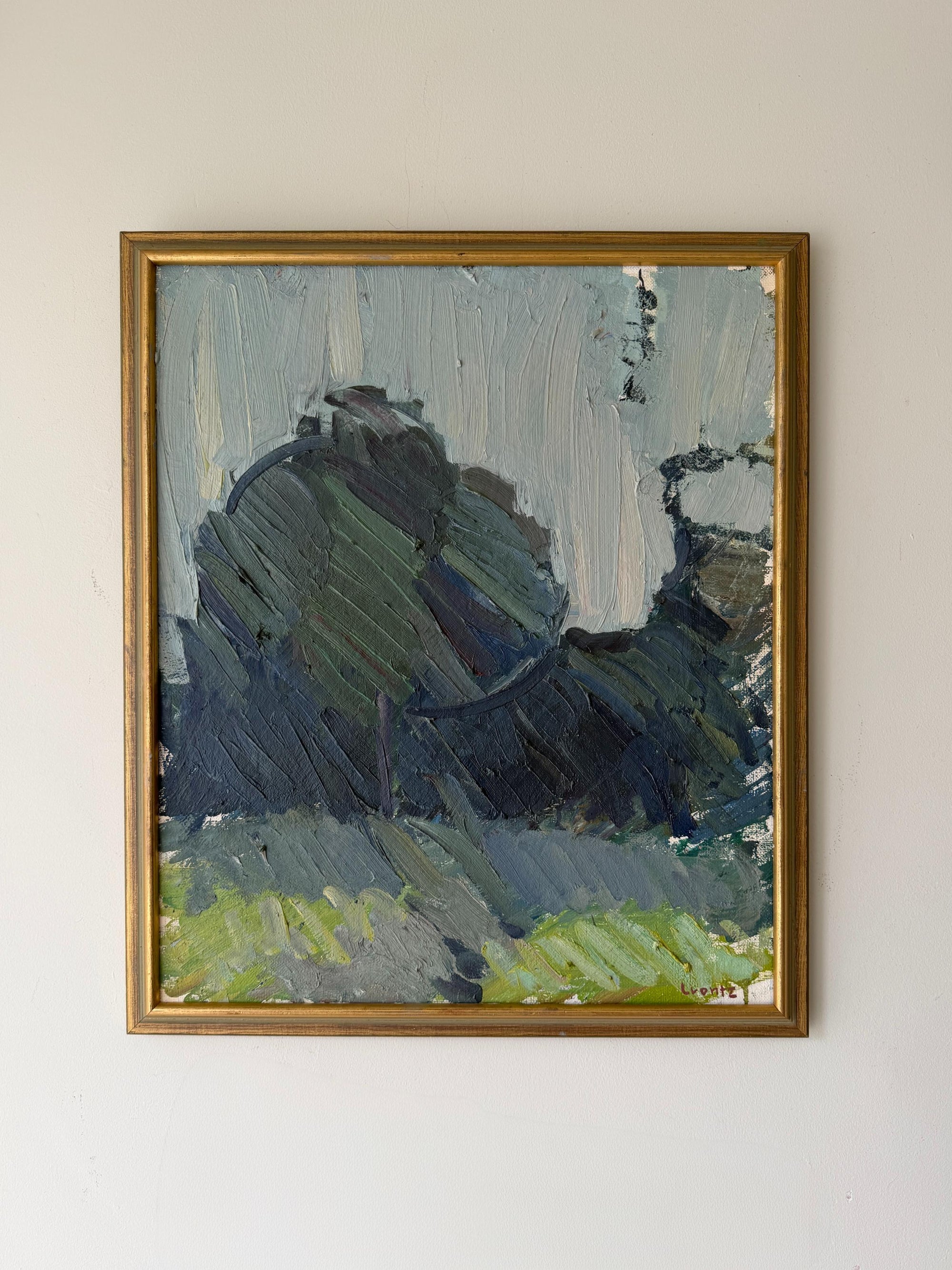 A framed semi-abstract vintage landscape painting featuring trees and a summer fields. Available at Hue.
