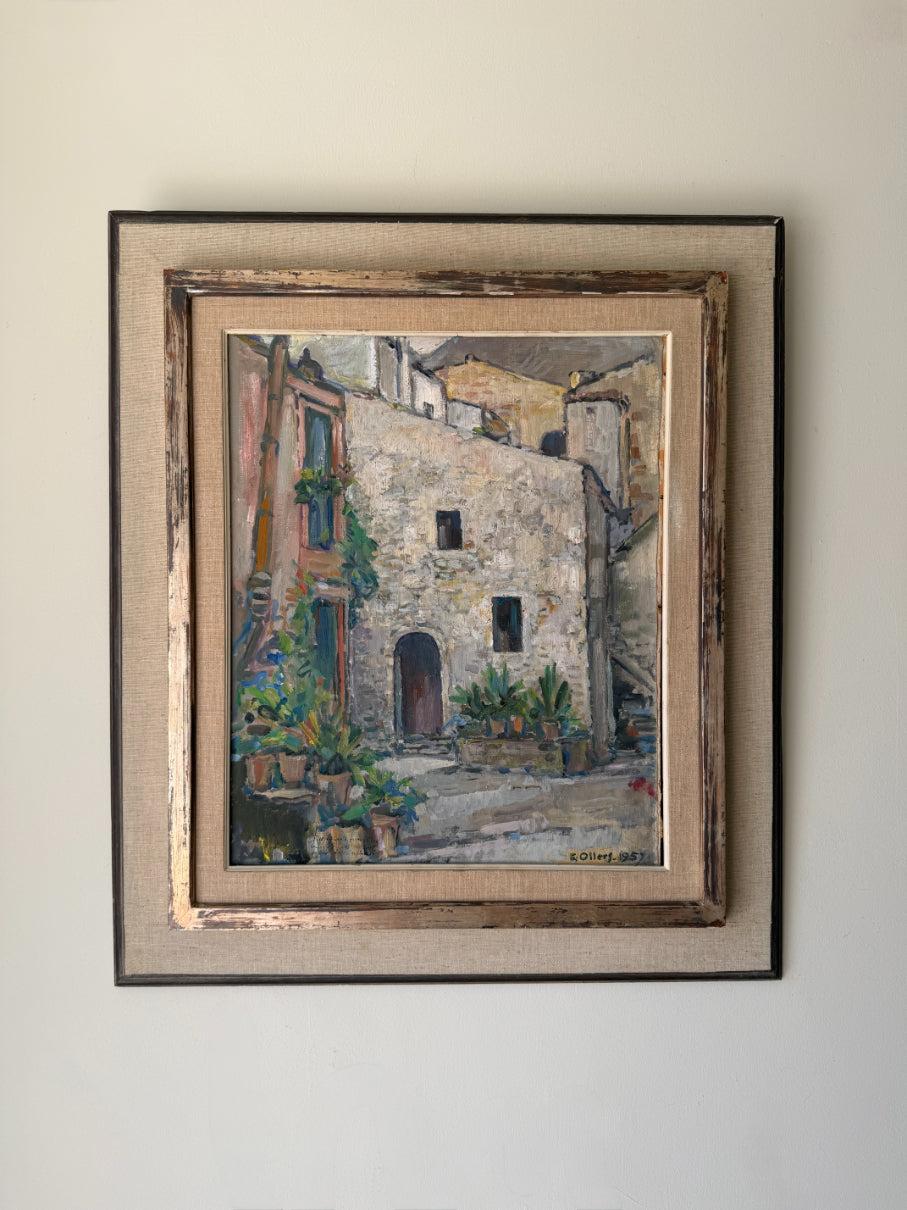 Framed vintage oil painting of a mediterrenean street scene. Available at Hue. 