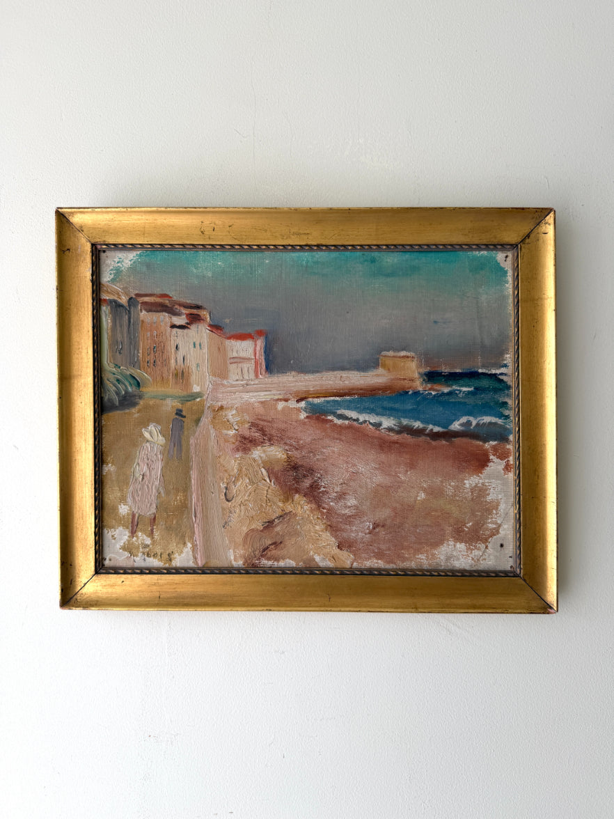 Framed vintage oil painting of a coastal scene. Available at Hue. 