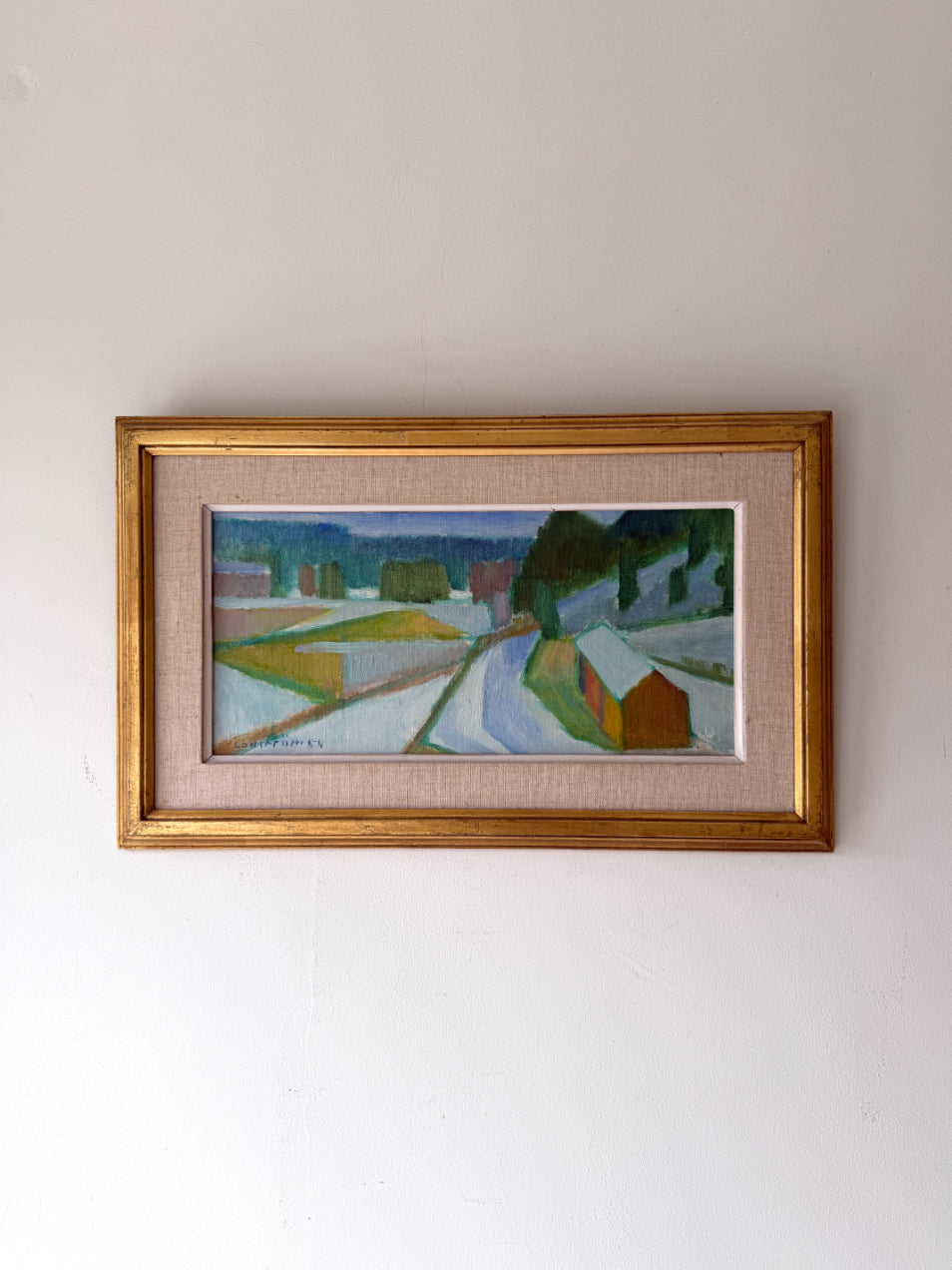 Framed vintage oil painting of a snowy, winter landscape. Available at Hue. 