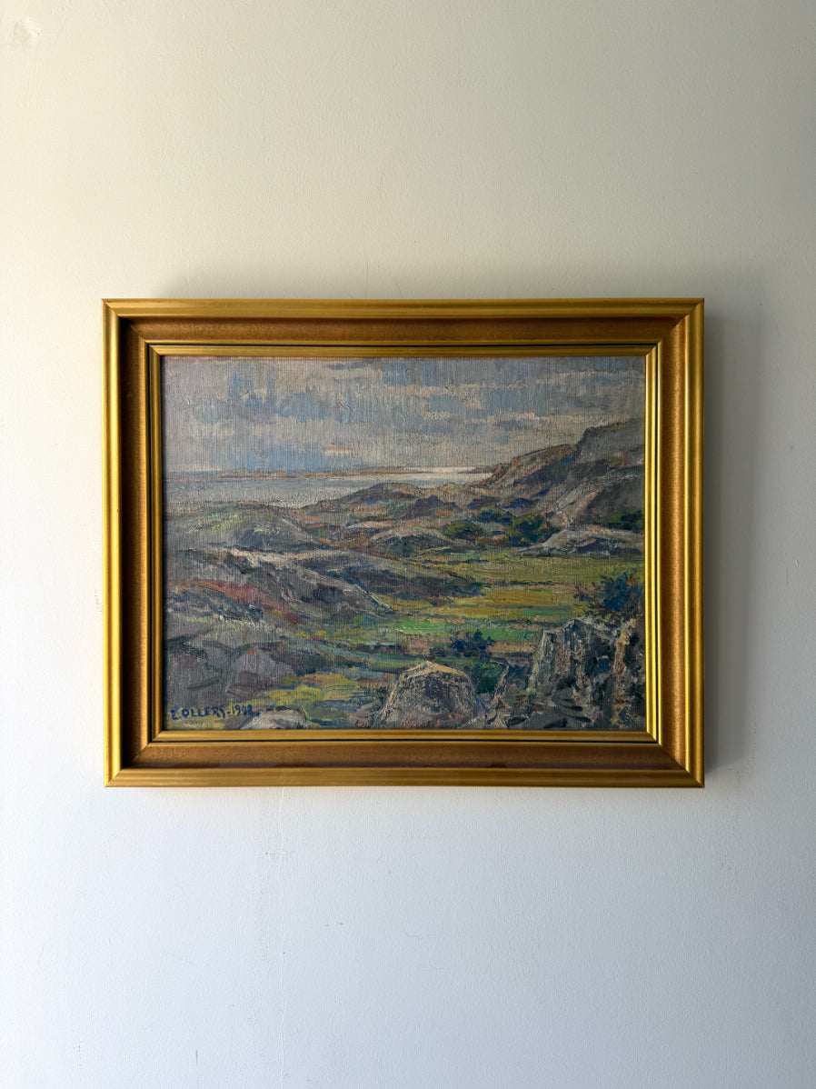 Framed vintage oil painting of a mountain landscape. Available at Hue. 