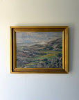 Framed vintage oil painting of a mountain landscape. Available at Hue. 