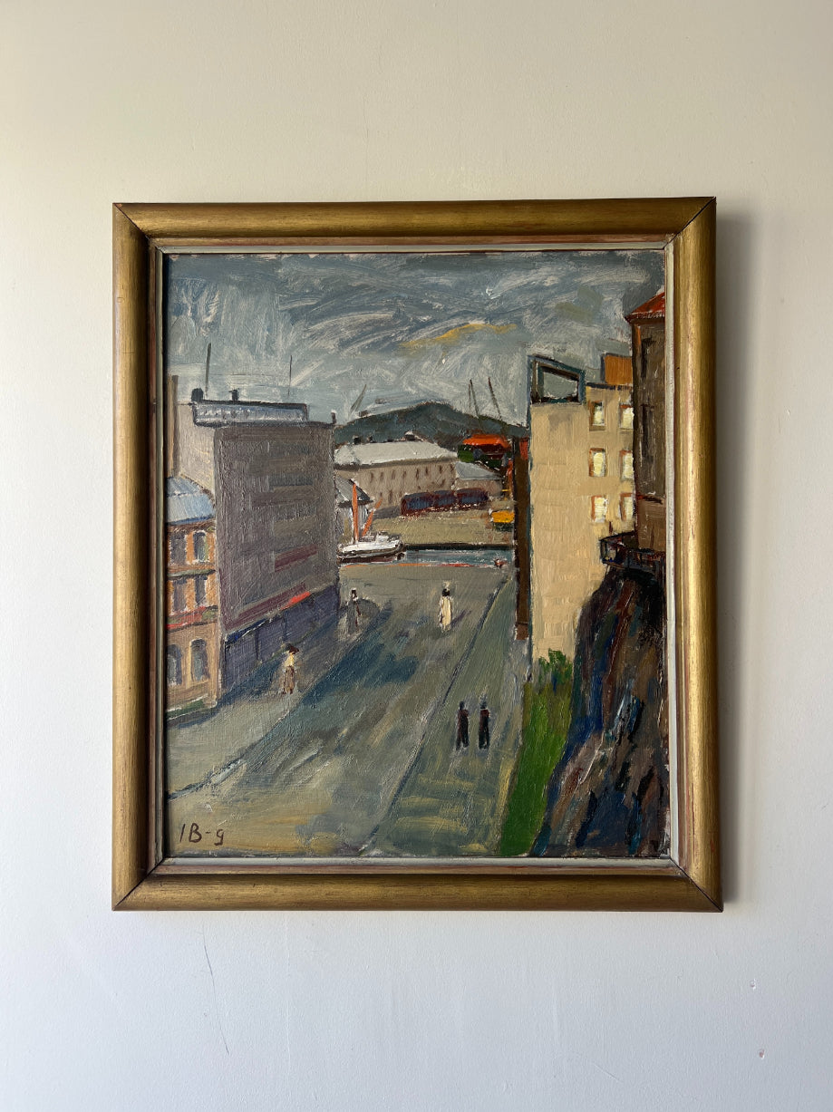 Framed vintage oil painting of an urban scene with buildings and a street. Available at Hue. 