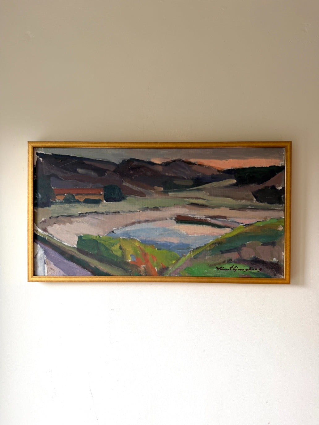 Framed vinatge landscape oil painting of a sandy bay with distant mountains. Available at Hue. 