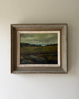 Framed vintage oil painting of green pastures and a diatant coastal horizon. Available at Hue. 