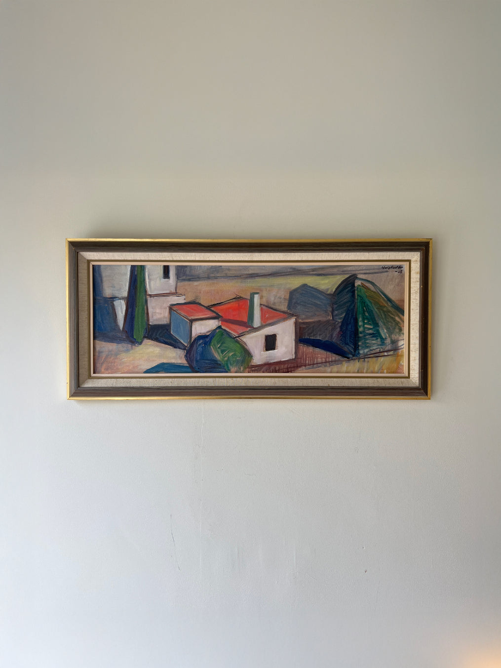 Large framed vintage oil painting of Mediterranean rural houses with red roofs. Available at Hue. 
