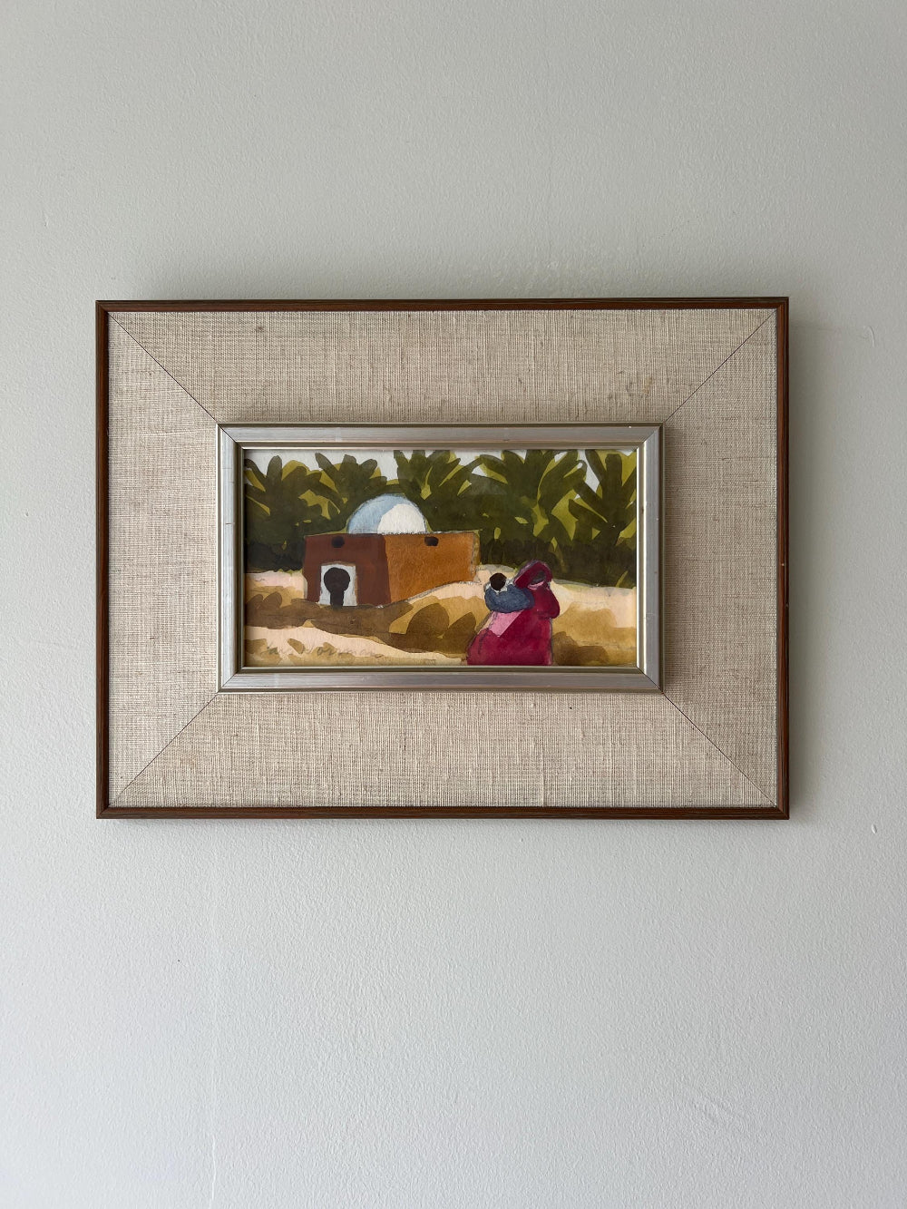 Framed vintage painting of a landscape with a house and people, available at Hue.