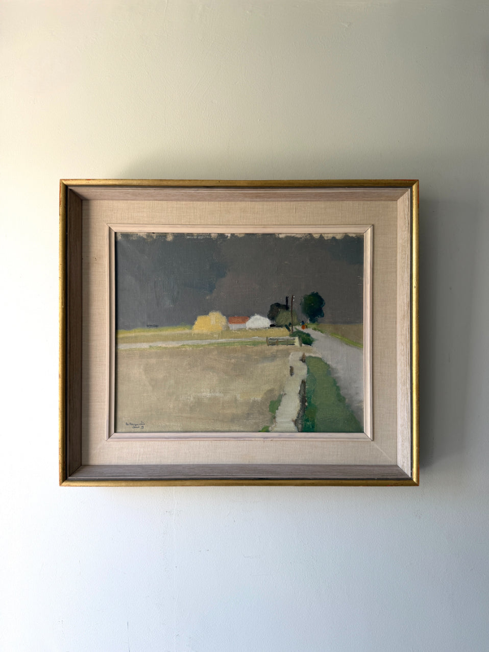 Framed vinatge oil painting of a landscape with fields and houses. Available at Hue. 