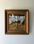 Framed vintage oil painting of a landscape with pine trees. Available at Hue. 