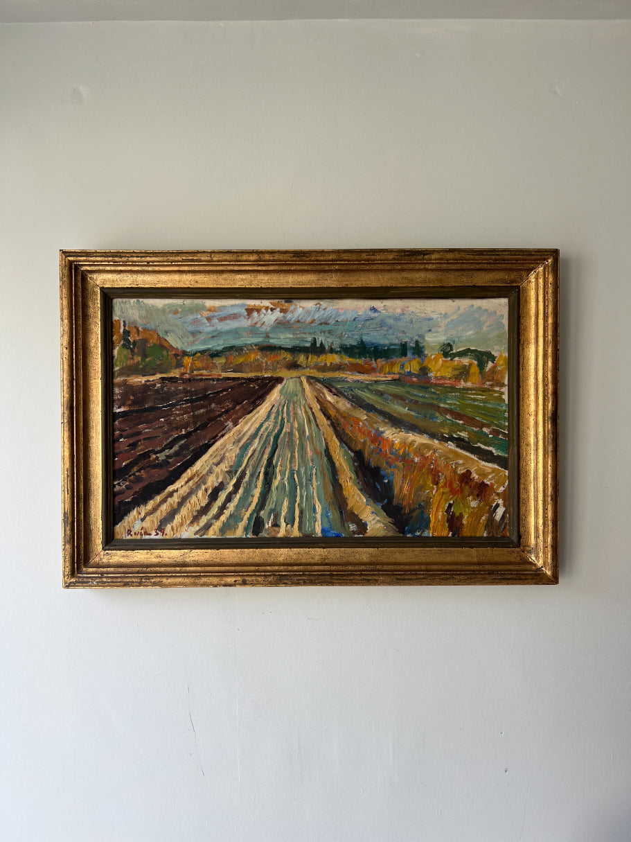 Framed vintage oil painting of a landscape of ploughed fields. Available at Hue.