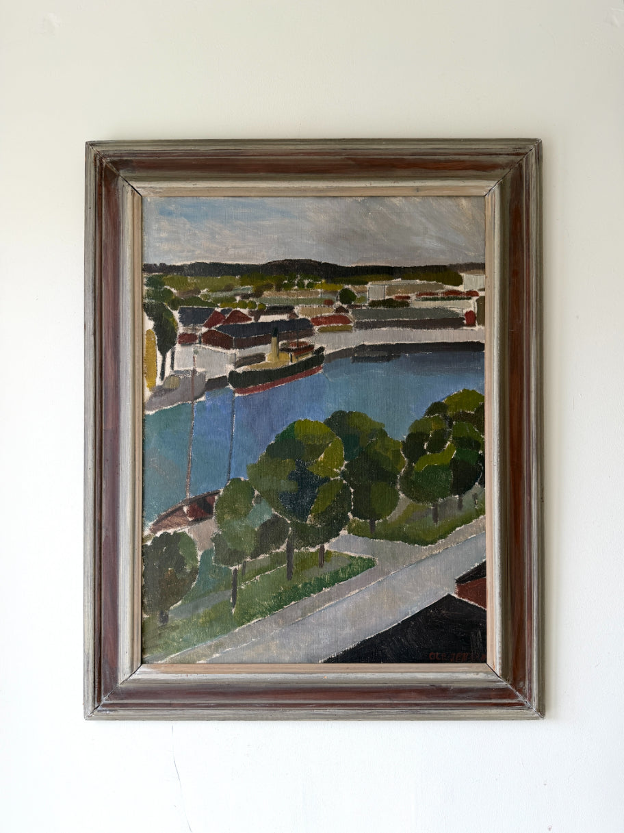 Framed vinatge oil painting of a harbor scene with a boat. Available at Hue. 