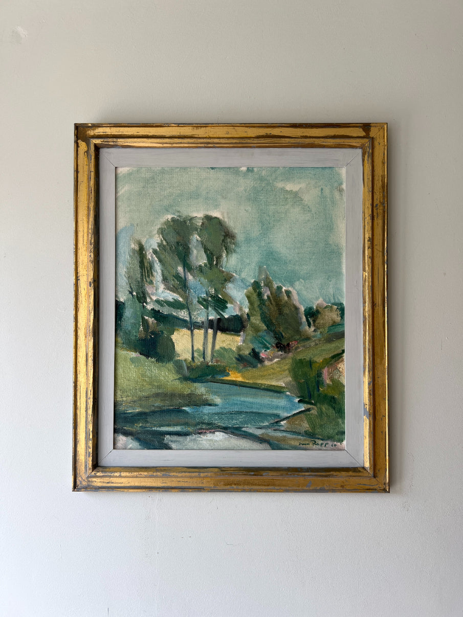 Framed vintage oil painting of a landscape with trees and a river. Available at Hue. 
