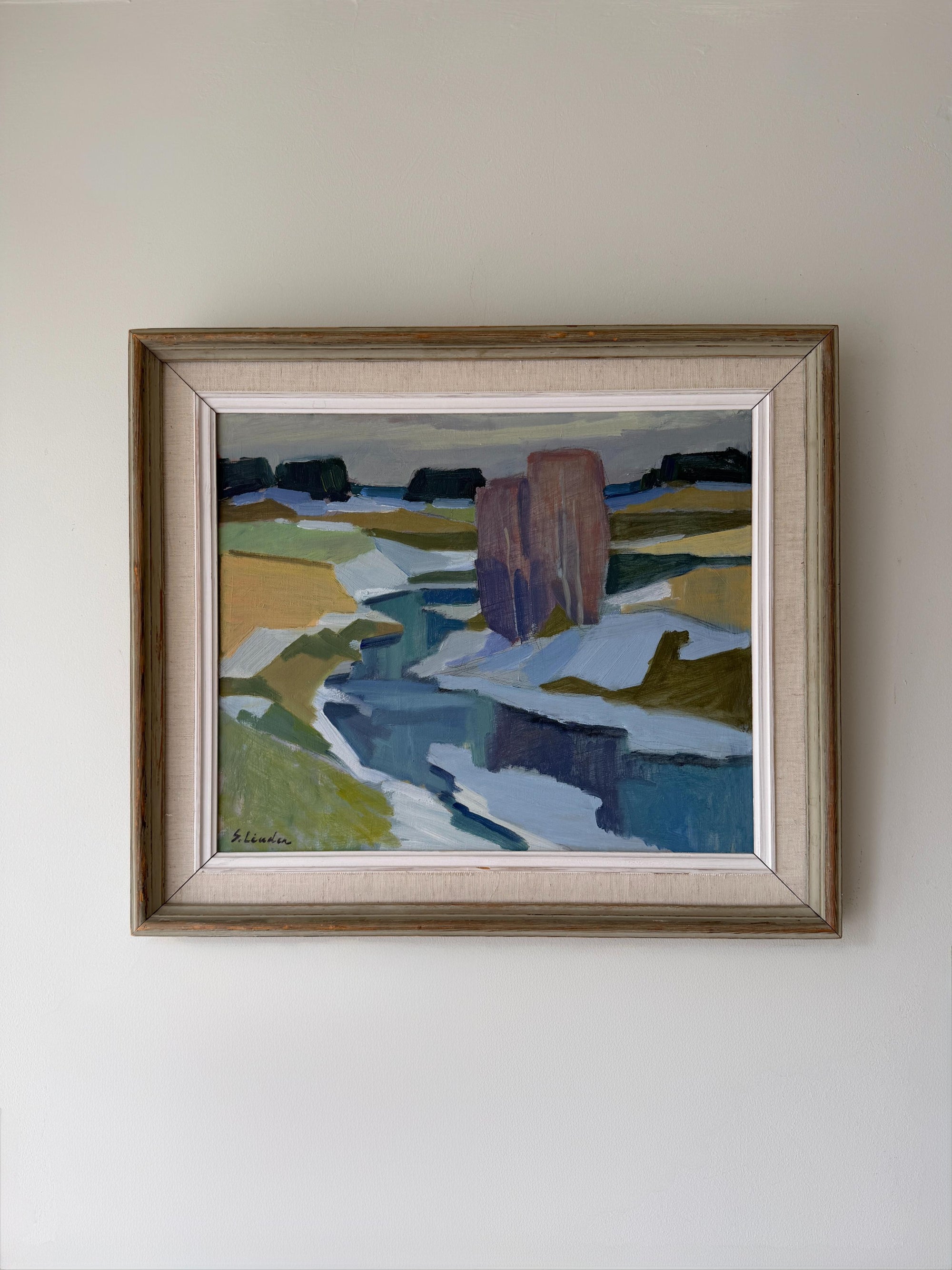 Framed vintage oil painting of a landscape with a river. Available at Hue. 