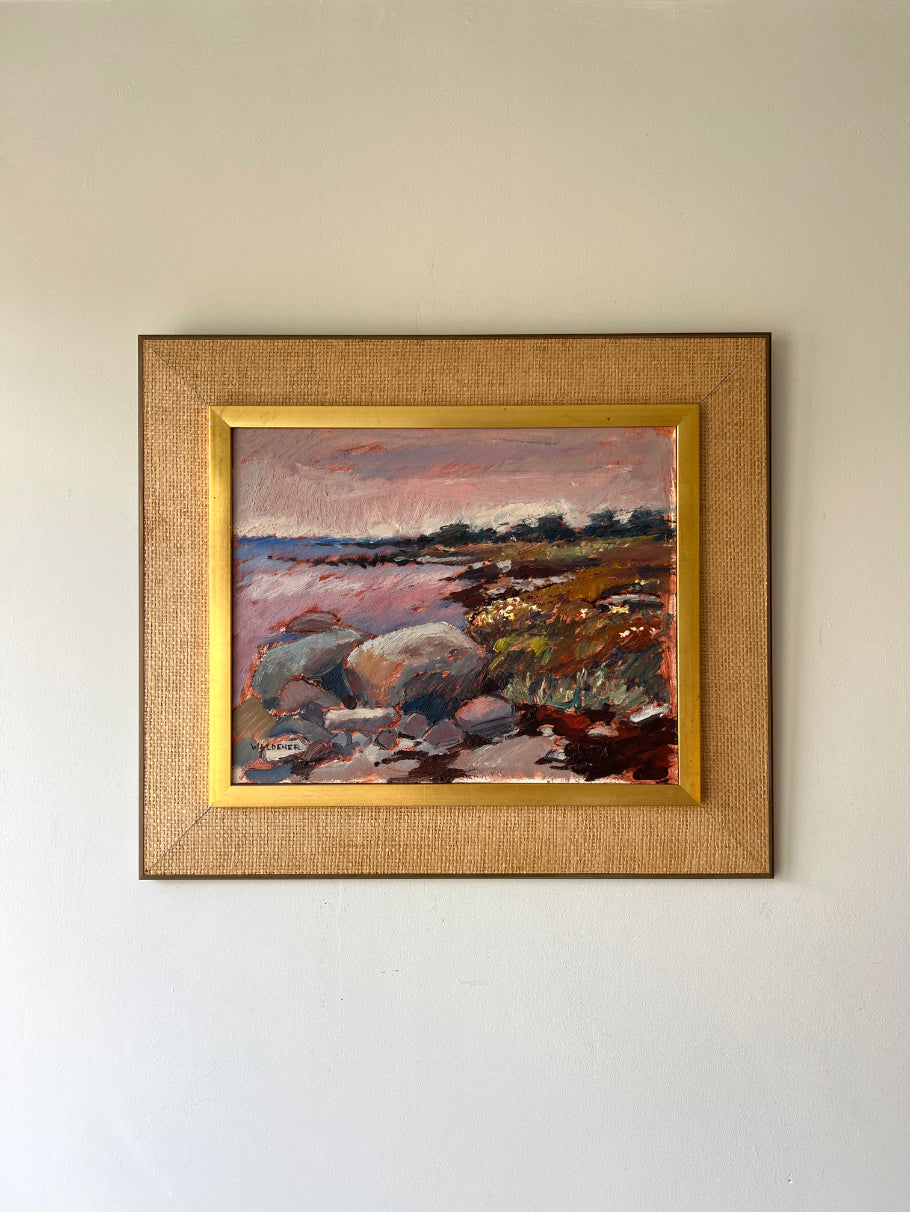 Framed vintage oil painting of a seascape with rocks. Available at Hue.
