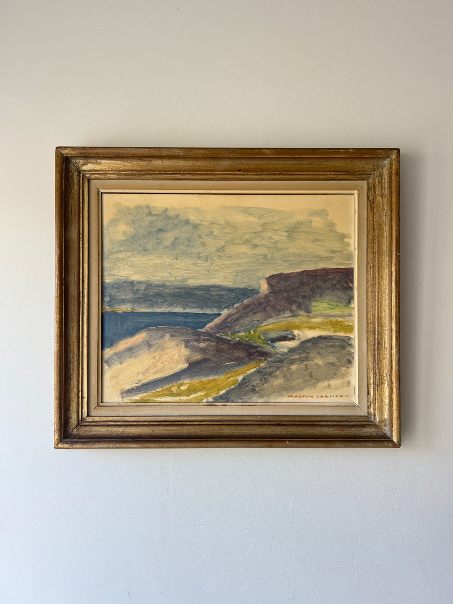 Frames vintage oil painting of a coastal scene with cliffs. Available at Hue. 