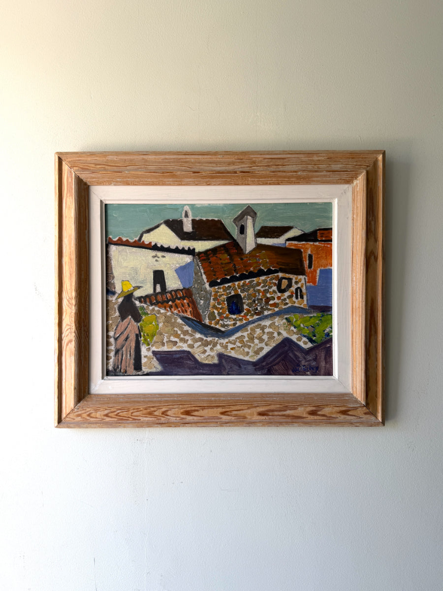 Framed vintage oil artwork of a Spanish village scene. Available at Hue. 