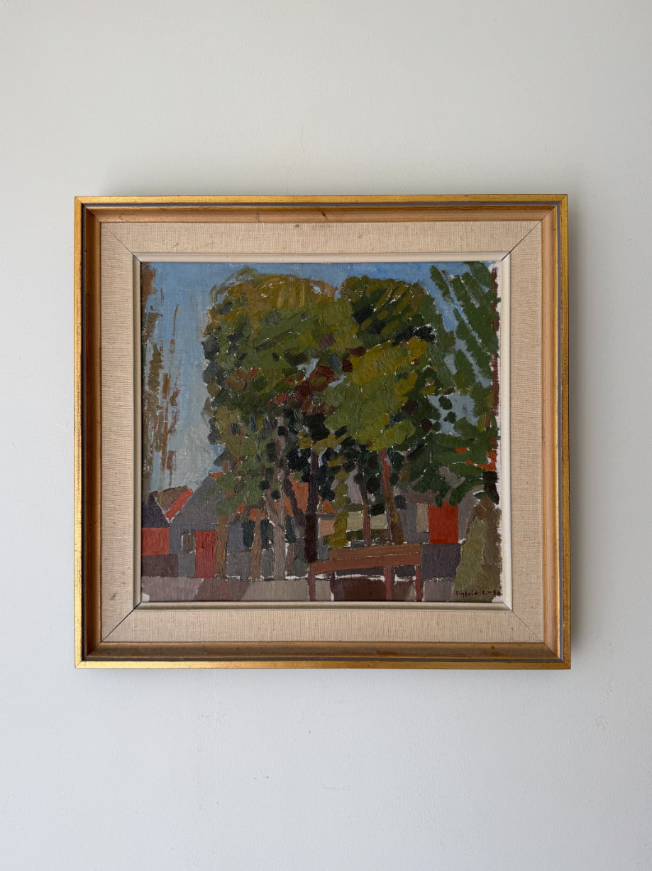 Framed vintage oil painting of a landscape with a large tree and buildings. Available at Hue. 