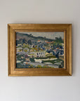 Framed vintage oil painting of a landscape with a houses on a hillside. Available at Hue.