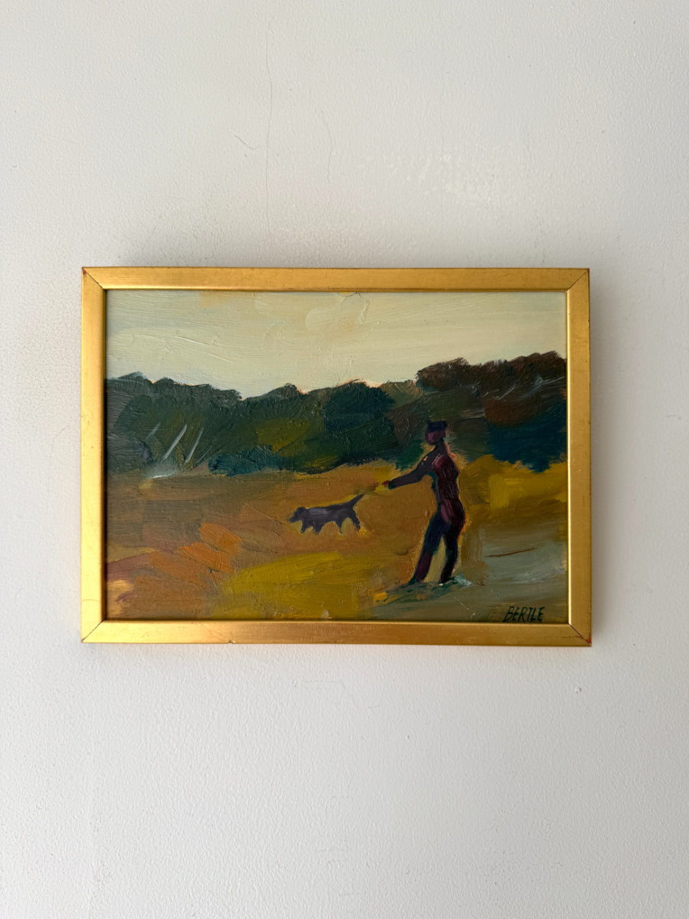 Framed vinatge oil painting of a person with a dog on a landscape. Available at Hue. 